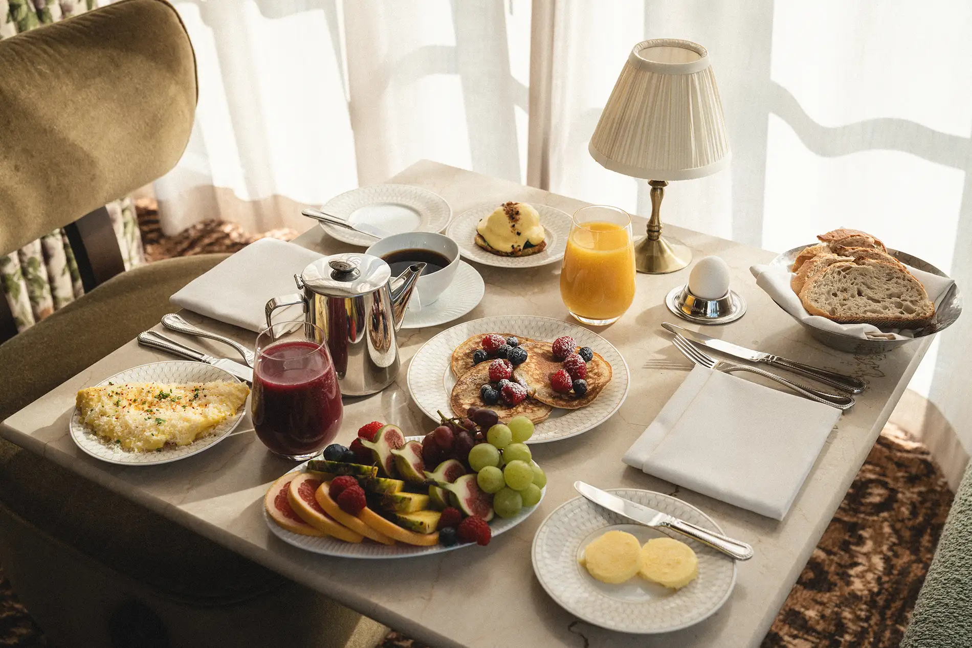 Brunch or breakfast at Rox. American pancaked, bred, fruits and eggs.